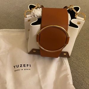 Yuzefi Delila color lock handbag